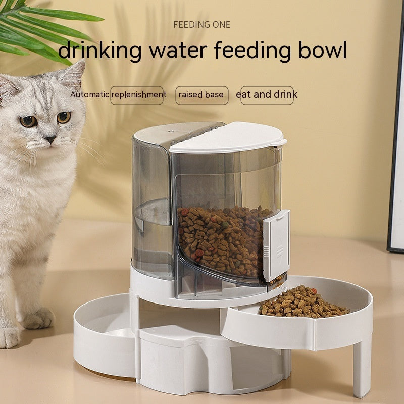 Automatic Water Change Pet Feeder with cat on packaging showing dual bowl design