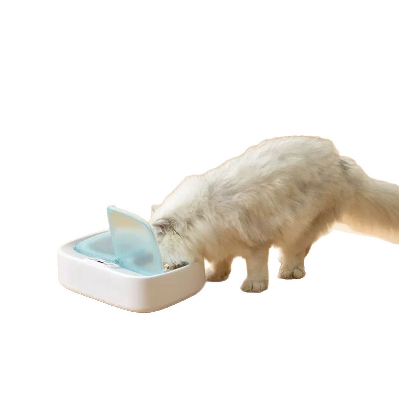 Smart Automatic Dual-Feeding Pet Feeder with Timer and a cat interacting with it.